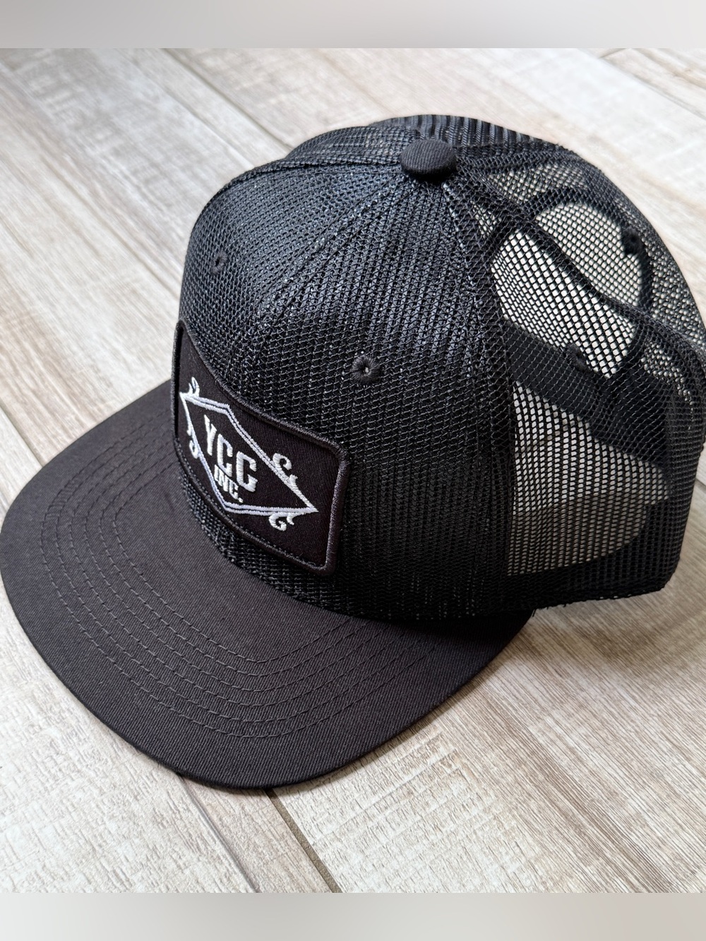 Limited Edition YCG Inc. Black Trucker Hat